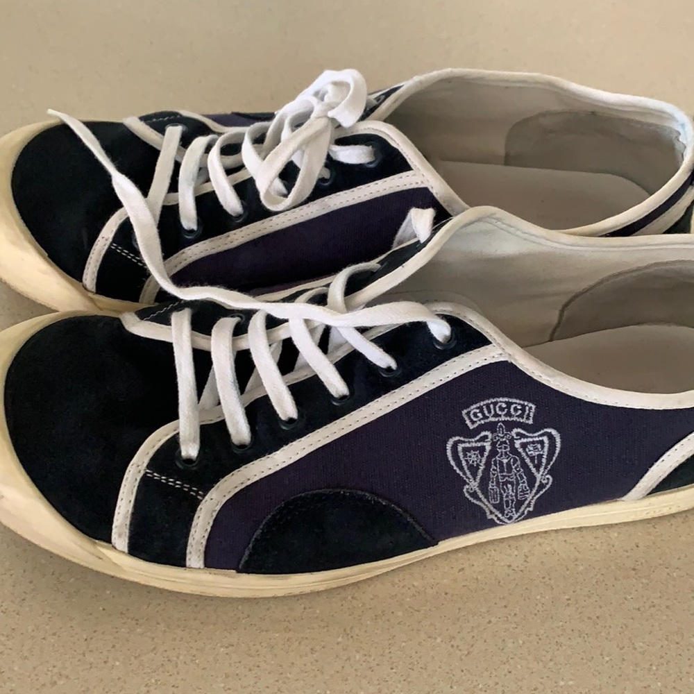 Neatly worn Gucci sneakers,